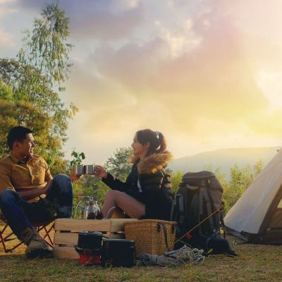 Young,Couples,Have,Good,Time,Morning,On,Camping,Trip,With